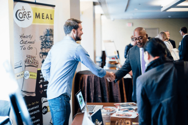 Networking at PCV's 2015 luncheon; photo from PCV's Facebook page